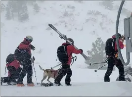  ?? MARK SPONSLER VIA AP ?? Rescue crews work at the scene of Wednesday’s avalanche at the Palisades Tahoe resort. “It felt stable,” a skier said about conditions prior to the tragedy.
