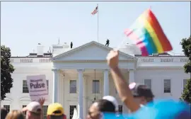  ?? THE ASSOCIATED PRESS FILE PHOTO ?? Most LGBT-rights activists never believed Donald Trump’s campaign promises to be their friend. With his move to ban transgende­r people from military service on Wednesday, July 26, 2017, on top of other actions and appointmen­ts, they now see him as...