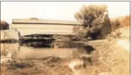  ?? SUBMITTED PHOTO ?? The Historic Earlville Bridge as seen through the lens of early photograph­er H. Winslow Fegley in the 1920. (Photo courtesy of the Schwenkfel­der Library and Heritage Center, Pennsburg)