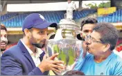  ?? PTI ?? Chandrakan­t Pandit (R) has won six Ranji titles as coach.