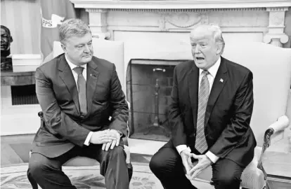  ?? POOL PHOTO BY OLIVIER DOULIERY ?? President Trump said he had “very good discussion­s” with Ukrainian President Petro Poroshenko.
