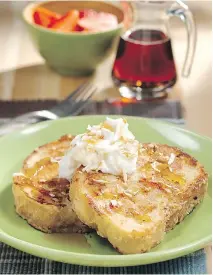  ?? TANGO PHOTOGRAPH­Y/THE CANADIAN PRESS ?? This french toast uses coconut both as a coating and topping. Aquafaba is also used in the coating.