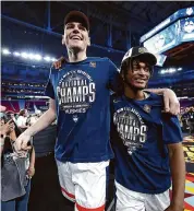  ?? Jamie Squire/Getty Images ?? UConn’s Donovan Clingan, left, Stephon Castle are both projected as lottery picks in the upcoming NBA Draft.