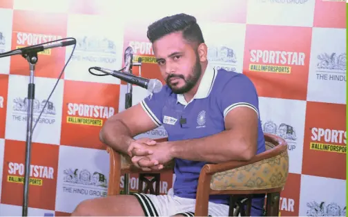  ?? B. JOTHI RAMALINGAM ?? All ears: Harmanpree­t listens intently during the tête-à-tête with Sportstar.