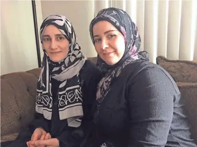  ?? TOM DAYKIN / MILWAUKEE JOURNAL SENTINEL ?? Nawal Motlk (left) and Riham Silan are planning to operate Milwaukee's first Syrian restaurant. They and their families fled Syria because of that nation's civil war.