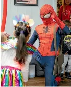  ?? ?? Rainbow Kids Parties employs students to play superheroe­s. SpiderMan is the most requested character.