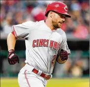 ?? JASON MILLER / GETTY IMAGES ?? Shortstop Zack Cozart has been on the disabled list since July 29 with an injured right quad. It was his second trip to the DL this season.