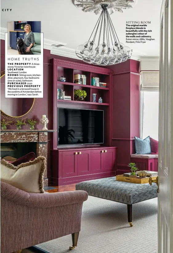  ??  ?? SITTING ROOM The original marble fireplace blends in beautifull­y with the rich aubergine colour of the walls and cabinetry. Exton mirror, £882, Vaughan. Pendant, Fritz Fryer