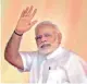  ?? — PTI ?? Prime Minister Narendra Modi waves to the crowd after his arrival at Shahanshah­pur, Varanasi, on Saturday.