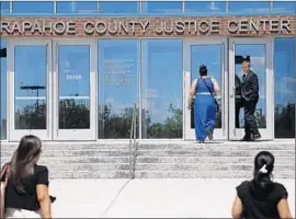  ?? Brennan Linsley
Associated Press ?? THE COURTHOUSE in Centennial, Colo., where James E. Holmes was convicted last week of killing 12 people in a rampage at a movie theater in 2012.