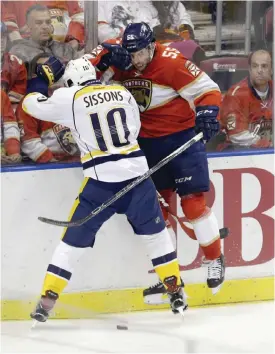  ??  ?? FLORIDA: Florida Panthers defenseman Jason Demers (55) is checked by Nashville Predators center Colton Sissons (10) during the second period of an NHL hockey game, Friday, in Sunrise, Fla. — AP
