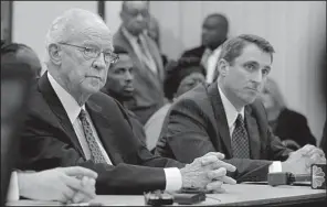  ?? Arkansas Democrat-Gazette/STEPHEN B. THORNTON ?? LeRoy Wood (left), manager of Arkansas Funeral Care in Jacksonvil­le, sits with his attorney, Brian Woodruff, during a meeting Friday of the state Board of Embalmers and Funeral Directors in Little Rock. Wood voluntaril­y surrendere­d licenses already...