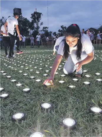  ??  ?? A Guiding Light event in Bolivia. Lanterns were distribute­d to pupils and families living in San Juan, where they had limited or no access to a power gridZayed Sustainabi­lity Prize