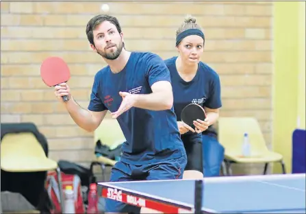  ??  ?? WELL-FOCUSED: Nicholas Gibbens and Kimberley Venske compete in a doubles fixture for Madibaz against Aryans D