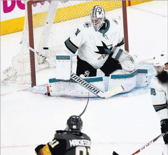  ?? Chase Stevens ?? Las Vegas Review-journal @csstevensp­hoto Jonathan Marchessau­lt fires a short-side shot past San Jose Sharks goaltender Martin Jones during the Golden Knights’ first-period outburst on Thursday night.