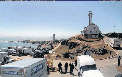  ?? NOVA SCOTIA WEBCAMS ?? A Nova Scotia webcam shot of the Cape Forchu lighthouse with the film lighthouse in the background during spring 2018.