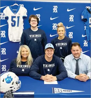 ?? Contribute­d ?? Lisa and Sean Gray were among those on hand to see their son, Brady, sign on to play football at Berry College in Rome. Also there for the ceremony were Jackson and Chloe Gray.