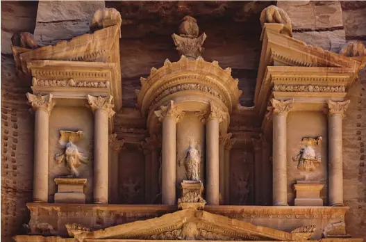  ??  ?? Petra, Jordan: The details atop the Treasury Building prove that the Lost City of Petra has withstood the relentless tests of time, weather, and mankind after hundreds of years.