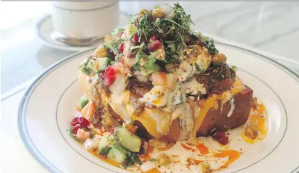  ?? MARIE-FRANCE COALLIER ?? The most sensual brunch dish in Montreal is the Moroccan toast at Arthurs Nosh Bar, featuring a thick challah slice topped with a poached egg, marinated eggplant, tomato and cucumber salad, spiced chickpeas and tahini.