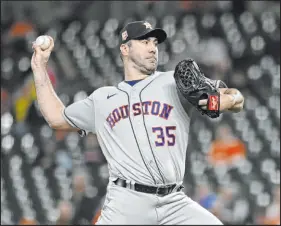  ?? Tommy Gilligan The Associated Press ?? Cy Young Award frontrunne­r Justin Verlander will be on the mound for game one as the Astros take on the Mariners.