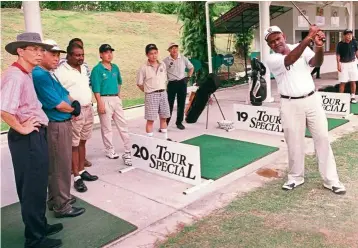  ??  ?? Flashback: Saujana resident pro nellan tellingly shows members of the press the proper way to swing a club.