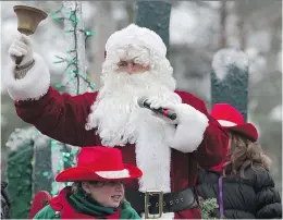  ?? ROBERT AMYOT/MONTREAL GAZETTE FILES ?? Santa Claus waves to the crowd in 2013. The parade is held the first Saturday in December.