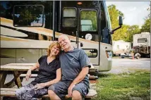  ?? WASHINGTON POST WILLIAM DESHAZER FOR THE ?? Joyce Ann Seid (left) and husband Steve, 77, sit outside of their RV at the I-24 Campground in Smyrna, Tenn.