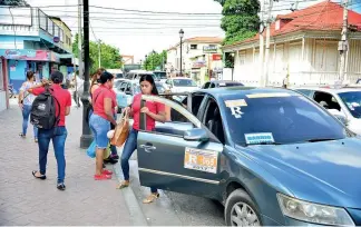  ?? R. FLETE ?? Seis mil conchos forman parte de la flotilla del transporte público en Santiago.