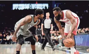  ?? EMILEE CHINN/GETTY IMAGES ?? Unlike Kevin Durant during his time with Golden State, James Harden and Kyrie Irving have consistent­ly failed to lead. They also have consistent­ly failed to work with their star teammates.