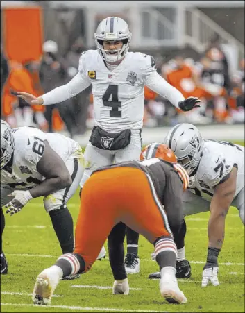  ?? Heidi Fang Las Vegas Review-Journal @Heidi Fang ?? Quarterbac­k Derek Carr noticed improved play on the line of scrimmage against Cleveland. “If we can continue to do that good things happen,” he said.