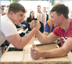  ??  ?? Jake Farrell and Gary Daly in the arm wrestling.