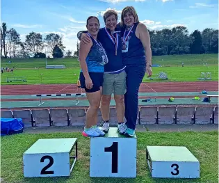  ?? ?? Emma Rich on the podium after winning gold in the Women’s (45+) Javelin at the British Masters Athletics Championsh­ips