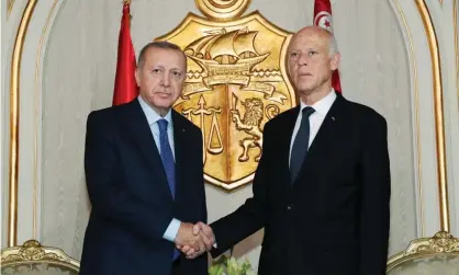  ??  ?? Turkey’s president, Recep Tayyip Erdoğan (left), meets his Tunisian counterpar­t, Kais Saied, in Tunis. Photograph: Anadolu Agency via Getty Images