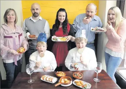  ??  ?? Some of the team behind the Gourmet Greystones festival at the launch in Las Tapas on Church Road. Back (from left): Cllr Grainne McLoughlin, Paul Quinn, the 3Qs, Louise Lennox, Dessert Queen, Martin Potts and Betty Stuart. Front: Dylan and Darcy Potts.