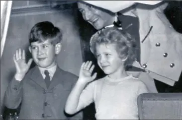  ??  ?? Happy memories: Prince Charles and Princess Anne taking the train to Balmoral in 1956