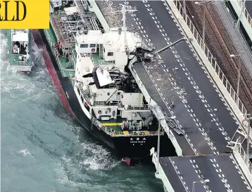  ?? KENTARO IKUSHIMA/MAINICHI NEWSPAPER VIA THE ASSOCIATED PRESS ?? A 2,591-ton tanker smashed into a bridge linking Osaka Kansai airport with the Japanese mainland on Tuesday.