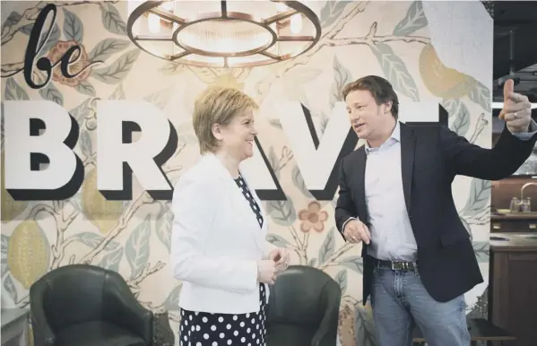  ??  ?? 0 Food for thought: Chef and restaurate­ur Jamie Oliver meets First minister Nicola Sturgeon in London for talks on a plan to tackle childhood obesity