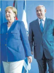  ?? FOTO: SINA SCHULDT ?? Angela Merkel und Benjamin Netanjahu am Ende ihrer Pressekonf­erenz.