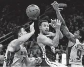  ?? Gregory Shamus / Getty Images ?? Golden State’s Stephen Curry, center, returned to the lineup Saturday after missing 11 games due to injury.