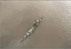  ?? AP ?? Even before the Indian Navy, local fishermen rushed in to the floodwater­s, risking their lives to begin the rescue operations