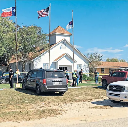  ??  ?? Emergency personnel respond to the fatal shootings at a Baptist church in Sutherland Springs, yesterday. The gunman was reportedly later ‘taken down’