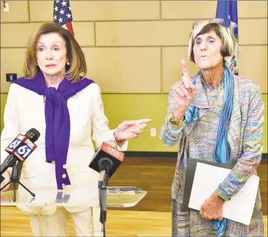  ?? Peter Hvizdak / Hearst Connecticu­t Media ?? House Speaker Nancy Pelosi, left, and U.S. Rep. Rosa DeLauro speak to reporters after a conversati­on on equal pay on Saturday at Gateway Community College in New Haven. The visit by Pelosi is part of the Speaker in the House series, which promotes agendas of the House Democrats while connecting with constituen­ts. Pelosi said Saturday she was optimistic that measures on background checks and pay equity would advance in Congress.