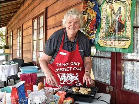  ?? PHOTO: BEV LACEY ?? TASTE OF THE PAST: Sheila King cooks the Welsh cakes offered as part of the Royal Bull’s Head Inn’s ‘A Taste of Celtic’ day.