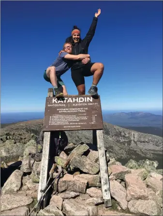  ?? PHOTO PROVIDED BY MIKAELA KOSTRUBIAK AND BEN VAN-KOOTEN ?? Ben Van-Kooten and Mikaela Kostrubiak at the northern end of the trail on Mount Katahdin in Maine.