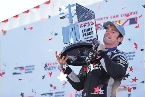  ?? AARON DOSTER, USA TODAY SPORTS ?? Simon Pagenaud celebrates after winning at Mid- Ohio Sports Car Course in July. The race presented a pivotal moment that was instrument­al in allowing Pagenaud and teammate Will Power to reach the season finale as the only title contenders.