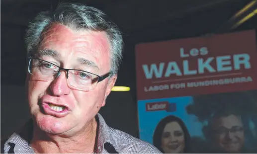  ??  ?? Labor’s Les Walker speaks to media following the 2020 state election on Saturday night.
Picture: MATT TAYLOR.