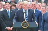  ?? CARLOS BARRIA / REUTERS ?? US President Donald Trump celebrates after the House of Representa­tives voted to repeal major parts of Obamacare, in Washington on Thursday.