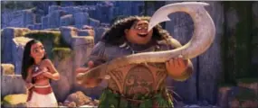  ?? DISNEY VIA AP ?? This image released by Disney shows characters Maui, voiced by Dwayne Johnson, right, and Moana, voiced by Auli’i Cravalho, in a scene from the animated film, “Moana.”