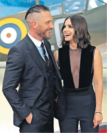  ??  ?? War epic: actors Tom Hardy, left, and Charlotte Riley arrive on the red carpet at the world premiere of Dunkirk in London