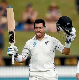  ?? PHOTOSPORT ?? Ross Taylor acknowledg­es the Seddon Park crowd after reaching three figures in Hamilton yesterday.